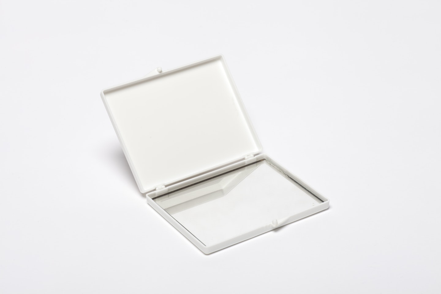 case opened, revealing mirror