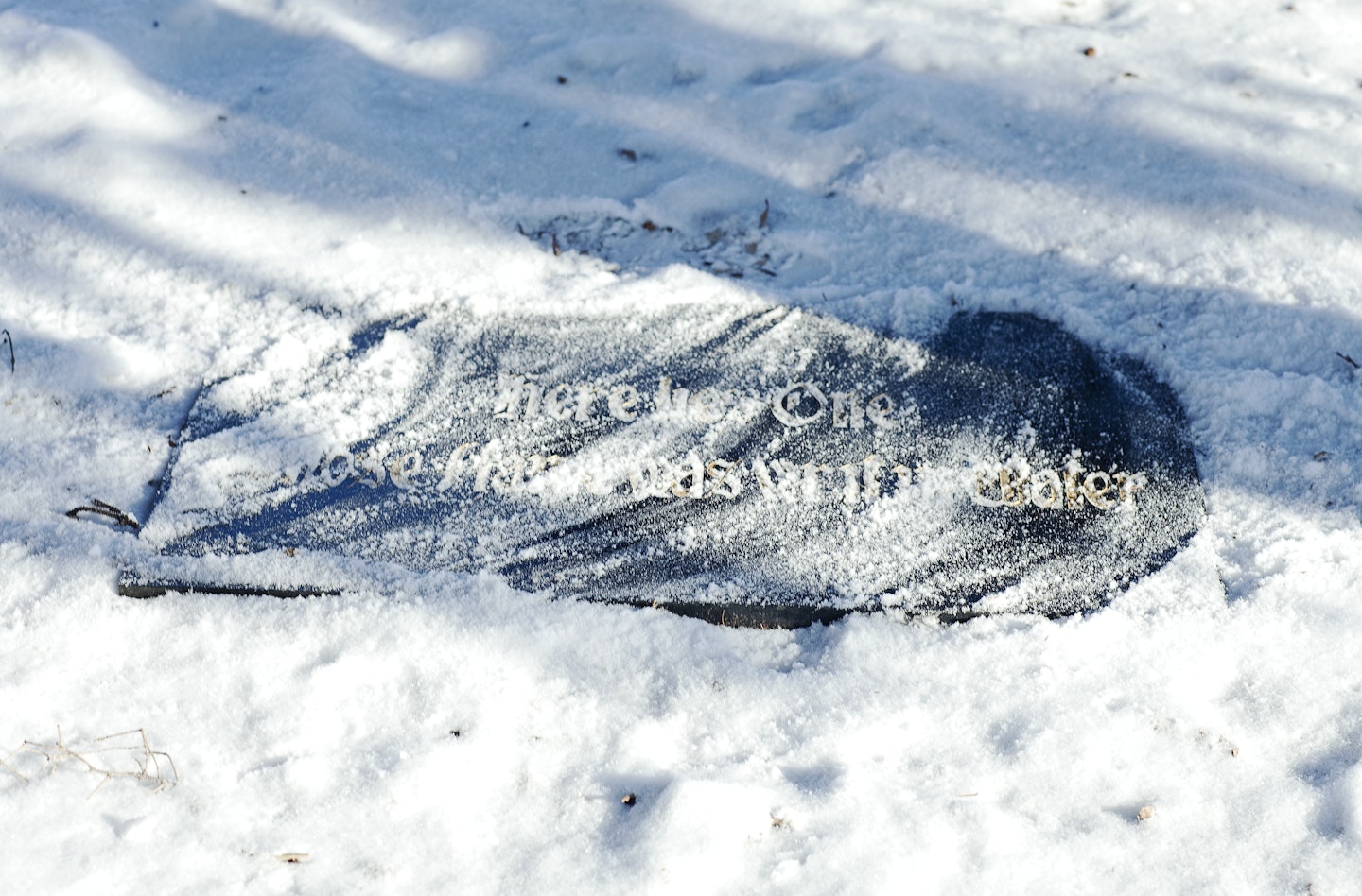 In winter, object is partially obscured by snow. View 12.