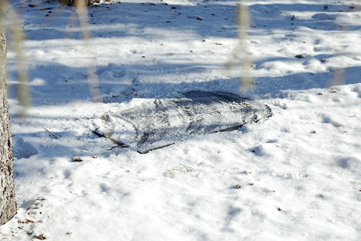 In winter, object is partially obscured by snow. View 13.