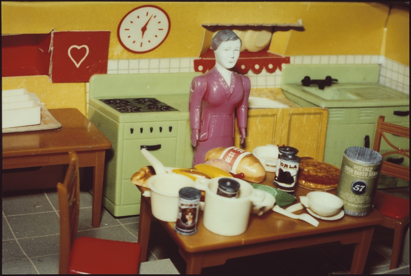 Woman/Purple Dress/Kitchen