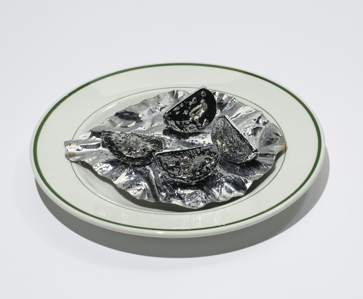 Chrome Tomato Slices on Lettuce Leaf
