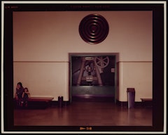 (Machine with circle and 2 people in museum, Chicago)