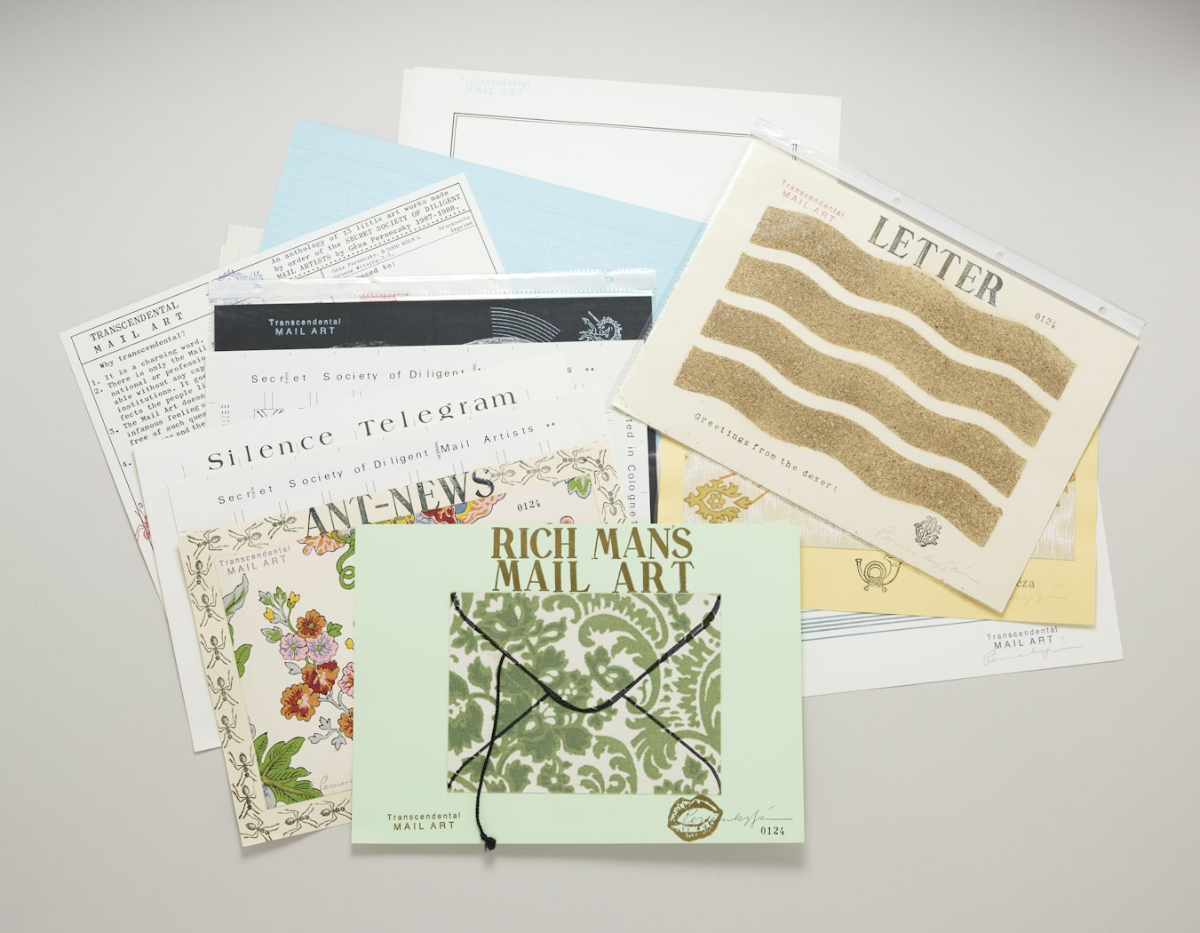 Transcendental mail art: an anthology of 13 little art works made by order of the Secret Society of Diligent Mail Artists.
