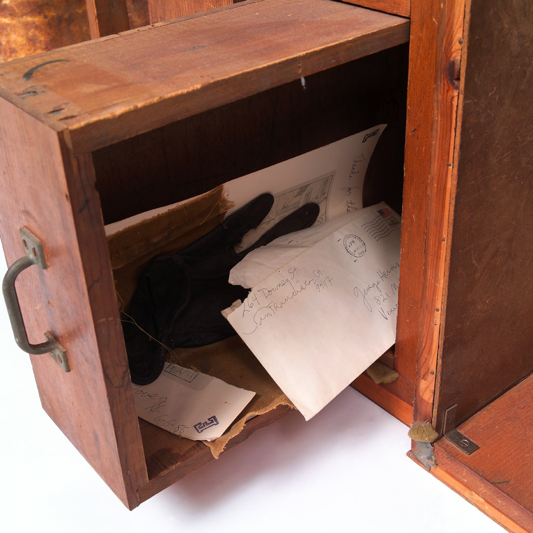 drawer with letter and glove