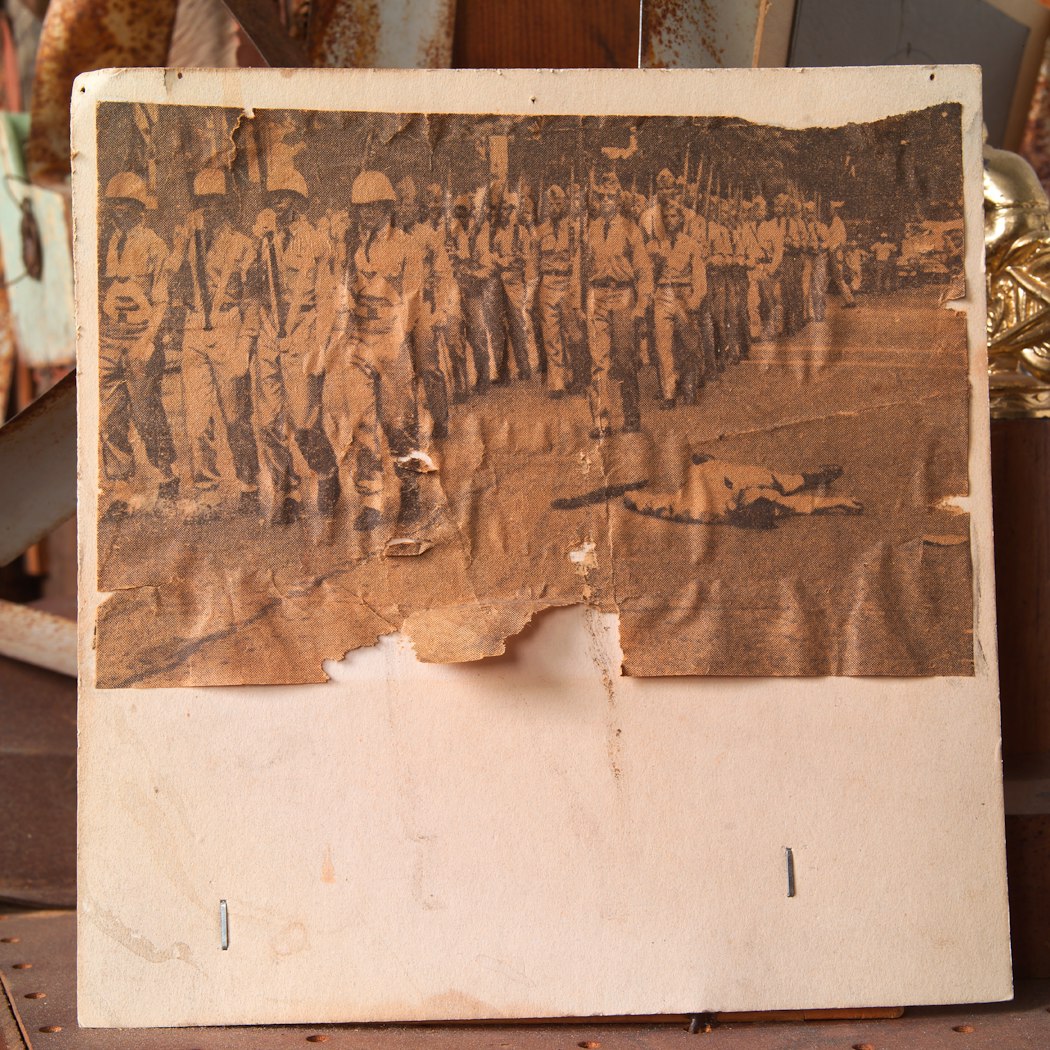 Newsprint image of marching troops