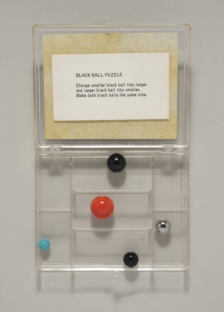 Games & Puzzles/Black Ball Puzzle