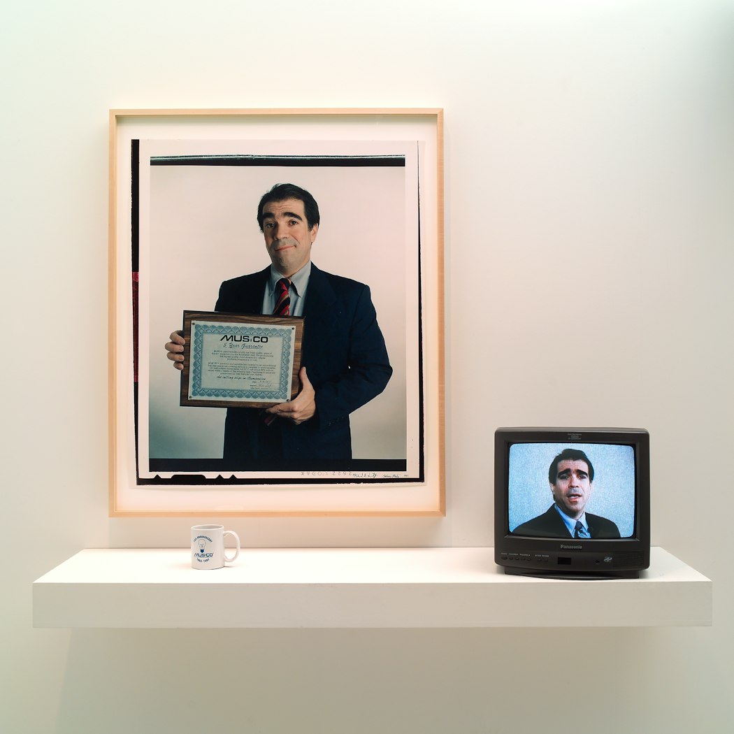 video still shows view of man on monitor
