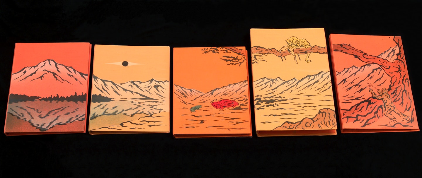 set of 5 books closed and placed side by side to form a landscape image