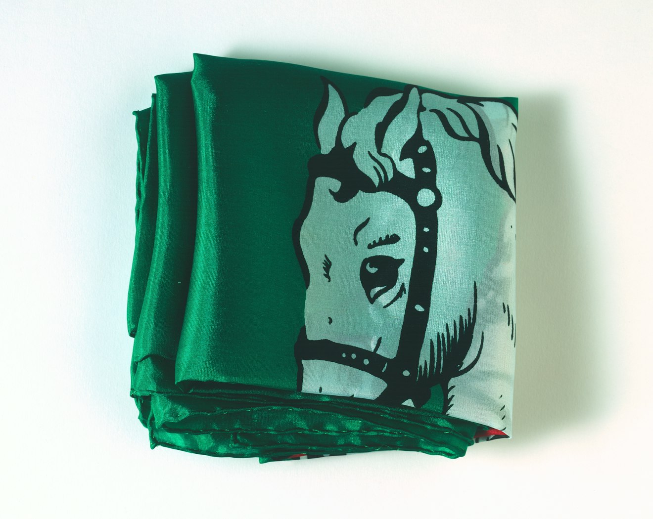 Scarf is folded showing partial view
