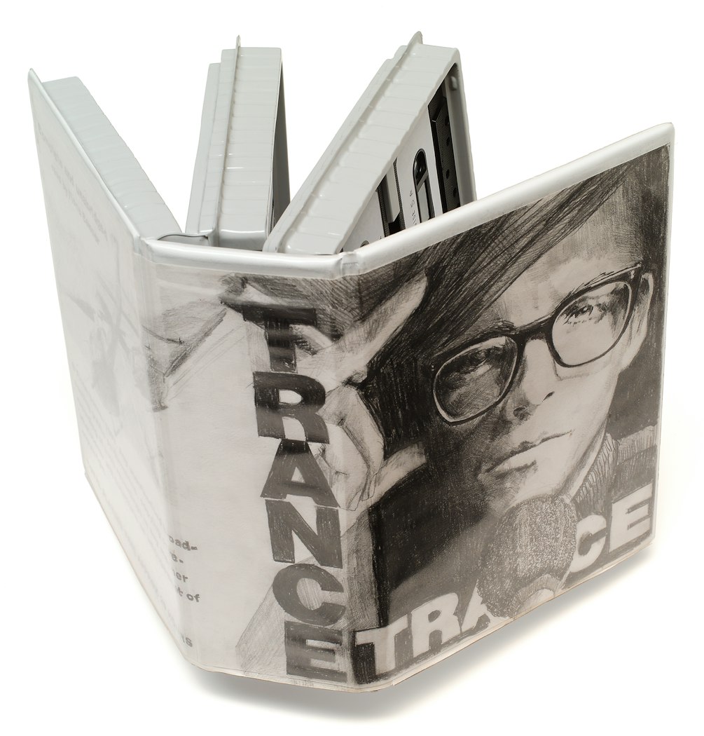 Object on end shows spine & cassette tapes inside