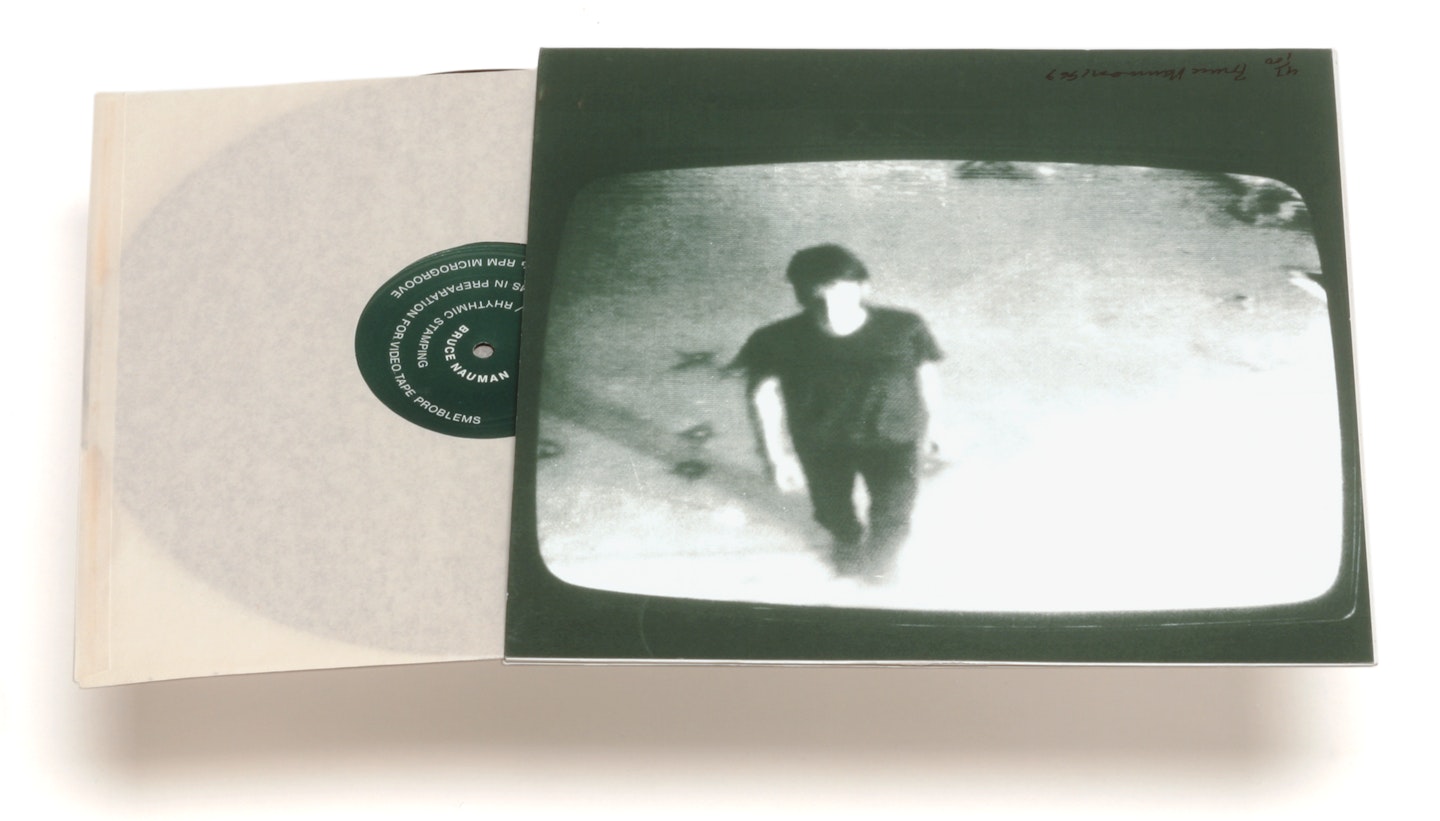 Album jacket atop record in paper sleeve