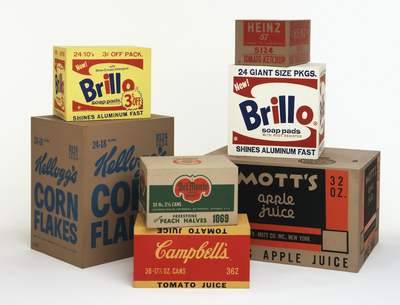 Studio view of seven product box sculptures