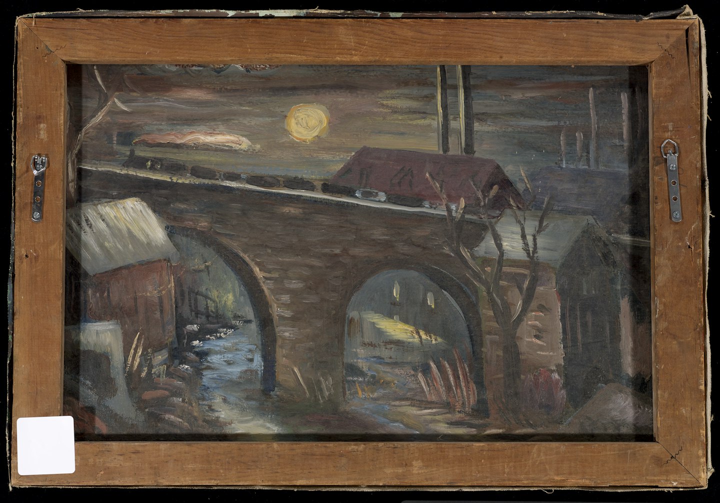 back of painting reveals another painting